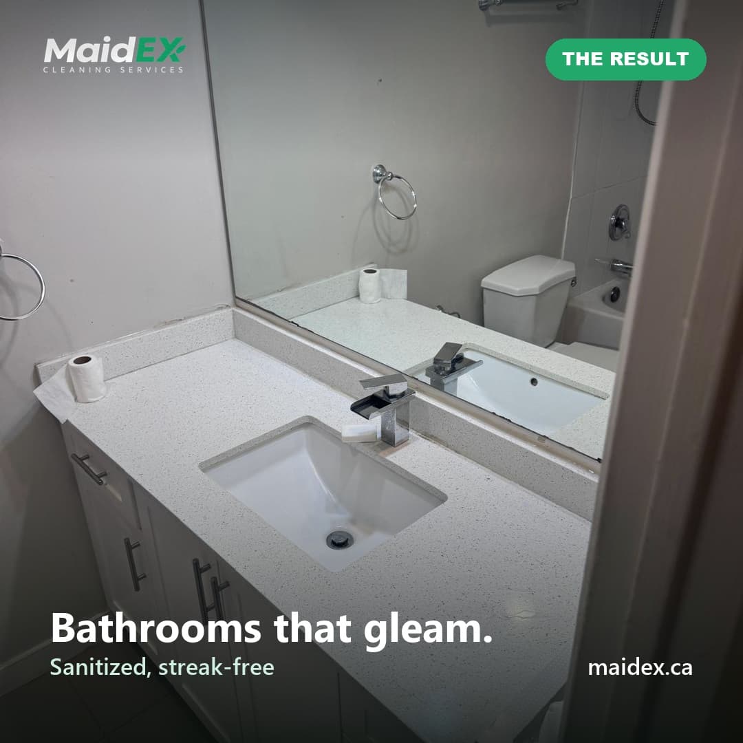 Sanitized, streak-free bathroom vanity and mirror after a MaidEX clean